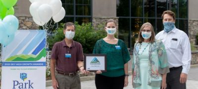 Mercy employees accept the 2020 Sky High Growth Award from the Asheville Chamber of Commerce